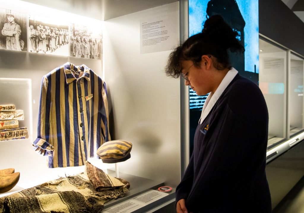 Student looking at artefacts at the Sydney Jewish Museum